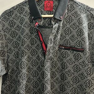 Stylish Black and White Polo Shirt with Red Accents